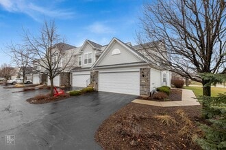 Building Photo - Yorkville First Floor End Unit Two Bed Condo with Pond Views