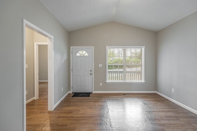 Building Photo - Like New Home off Freeman Mill.  Just Painted, New Wood/Vinyl Flooring, Vaulted Ceilings, Front P...