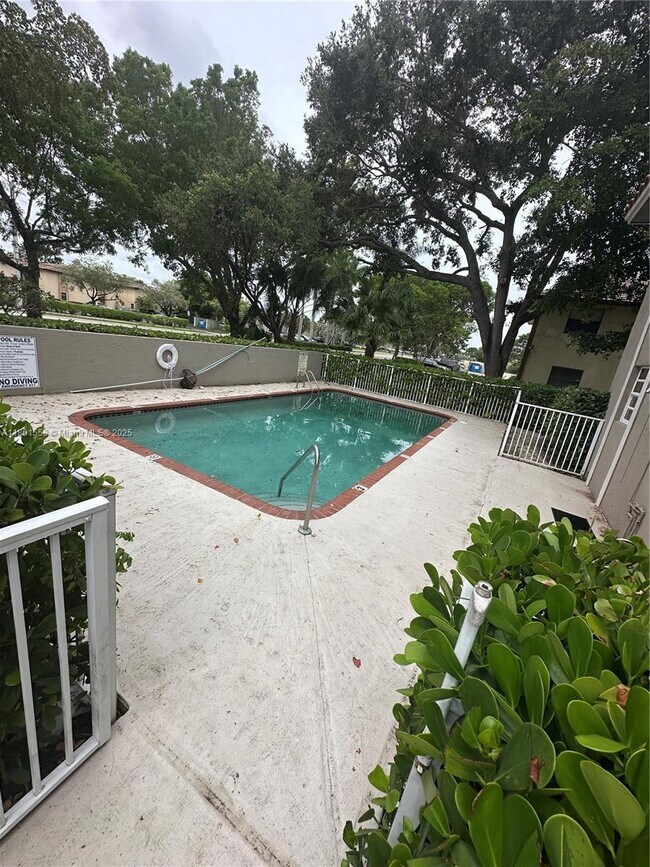Building Photo - 11213 Royal Palm Blvd