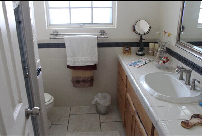 Building Photo - 8812 Cosmos Ave