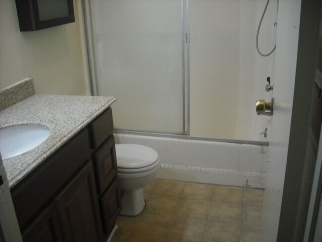 Building Photo - Spacious and private Penthouse Condominium