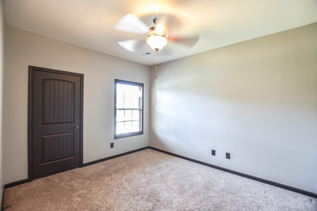 Building Photo - Pet Friendly Three Bedroom with Bonus!