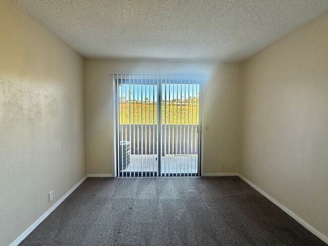 Building Photo - 2BD/2BTH with Private Patio, Walk-In Closet, Onsite Laundry, and Parking!