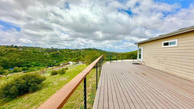 Building Photo - Stunning Single-Story with Spacious Deck, Panoramic Views, on Gated/Fenced Property!