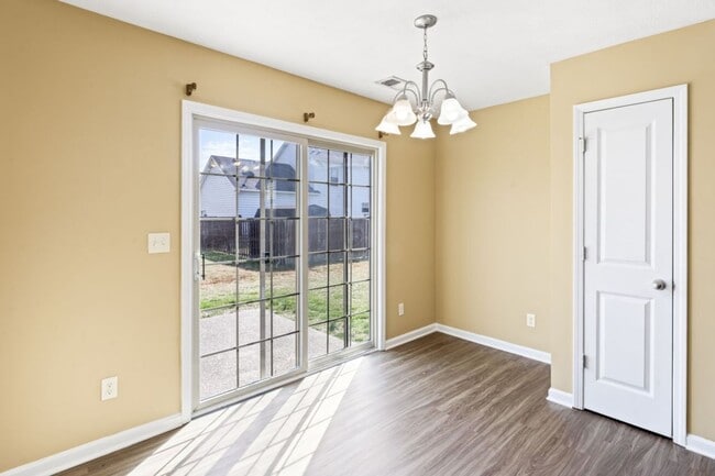 Building Photo - 3 bedroom 2 bath house for rent in abeautiful neighborhood.