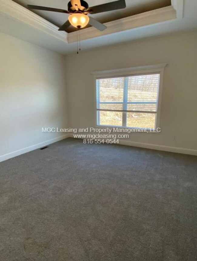 Building Photo - Location and Luxury Perfected in Parkville!