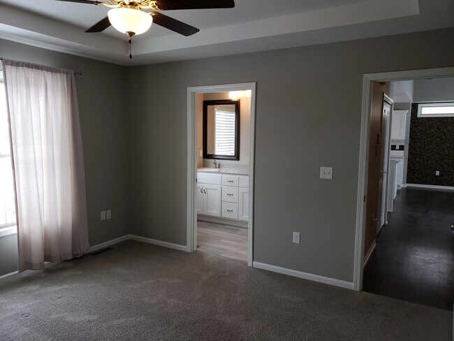 Building Photo - Cozy West Side Home + 2 Car Garage + Stain...