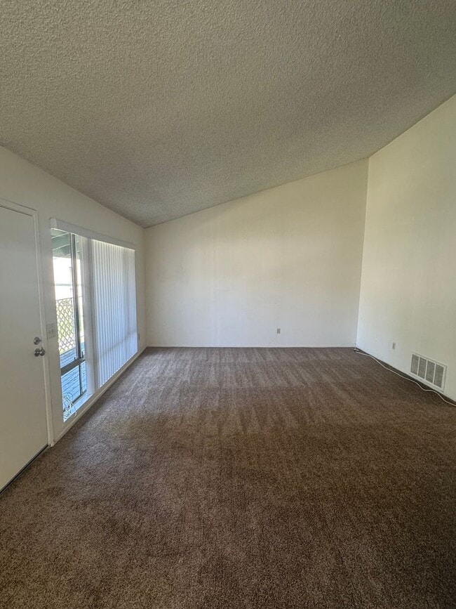 Building Photo - Upstairs two-bedroom 1/12 bath condo avail...