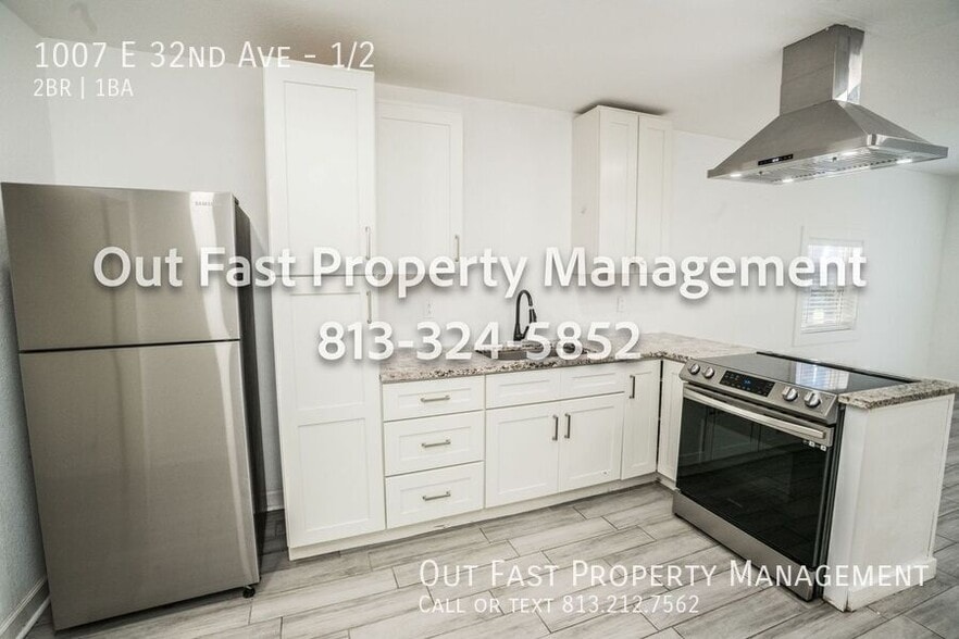 Building Photo - 1007 E 32nd Ave