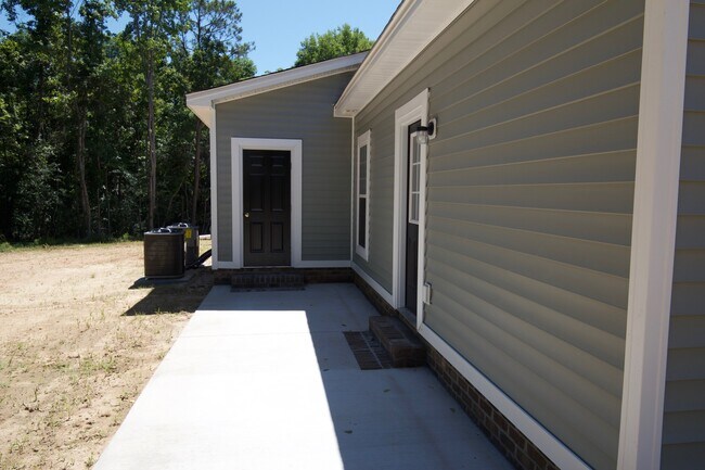 Building Photo - "Brand New Construction."  Quiet location, charming, cozy 3 bedroom duplex