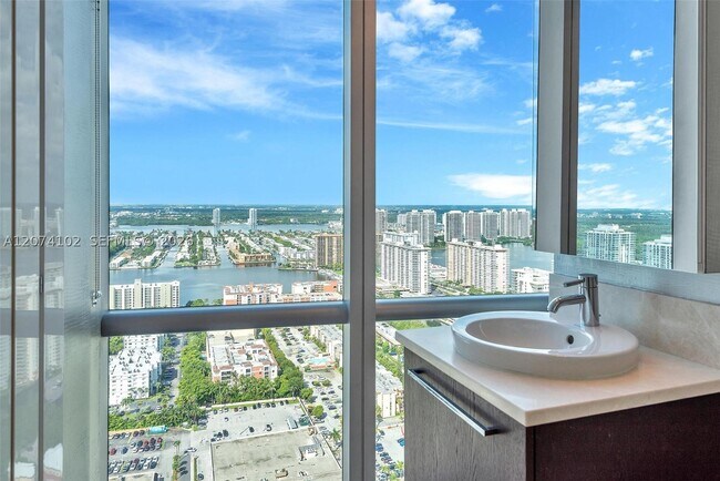 Building Photo - 17121 Collins Ave