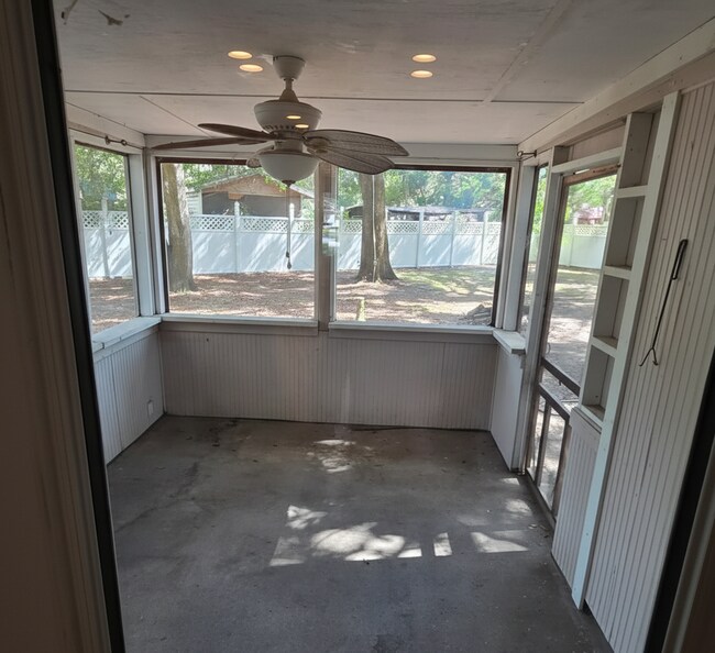 Building Photo - Corner Lot Charm: Spacious 4 Bed on Corner Lot w/ Custom Bookshelves & Private Storage Shed