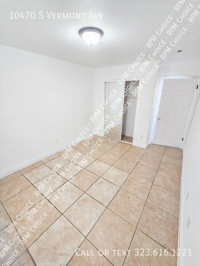 Building Photo - 10470 S Vermont Ave