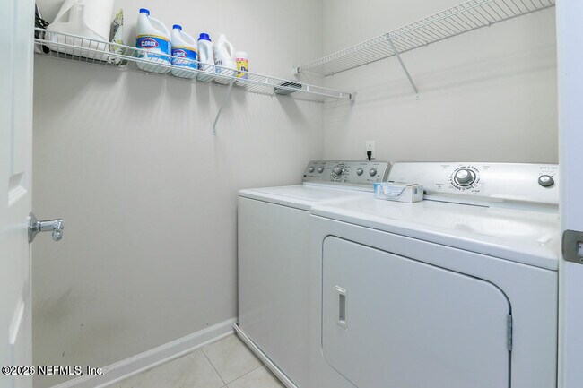 Building Photo - 6487 White Flower Ct