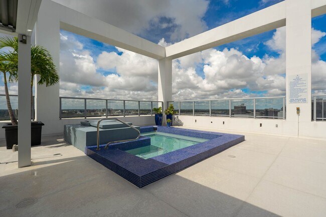Building Photo - “Sleek Design Meets Walkable Downtown Livi...