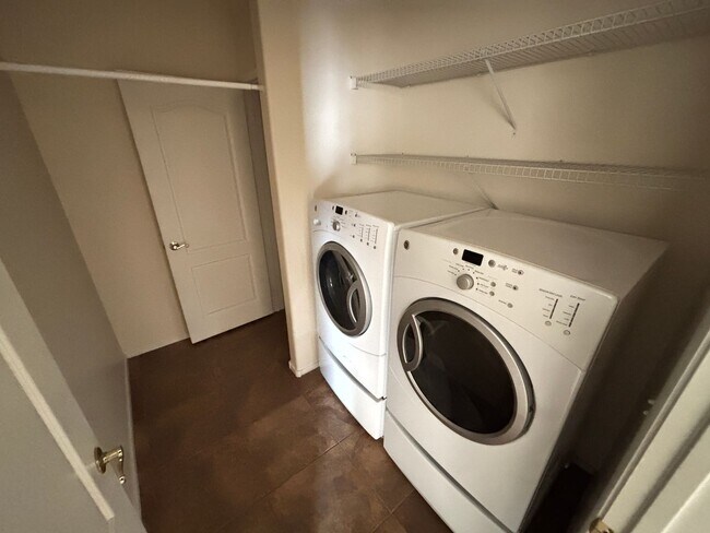 Building Photo - Charming 2Bed/Bath Condo located in a beautiful gated community in the Southwest.