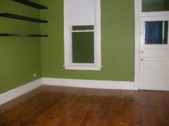 living room, door to den - 1944 W Chicago Ave