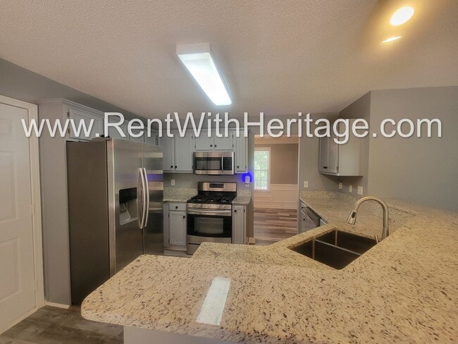 Building Photo - GORGEOUS HOME IN POPULAR HIGHLANDS AT CREEKSIDE GOLF / SWIM / TENNIS COMMUNITY