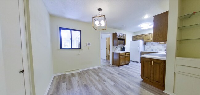 Building Photo - 3D Tour Available! West Side Home + Sunroom + Attached Garage + Pets Welcome + Washer & Dryer!  A...
