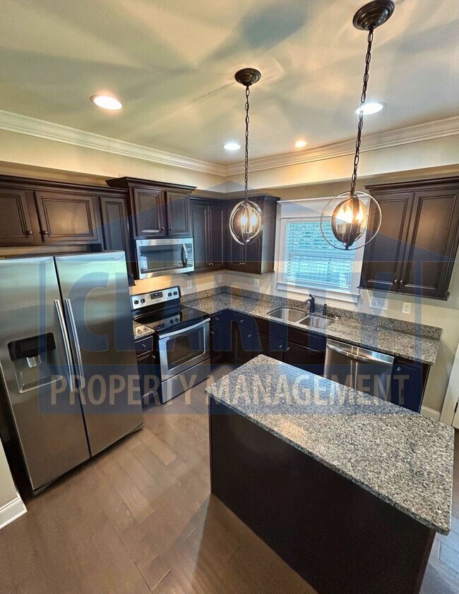 Building Photo - Modern, Upscale Townhouse w/ attached Garage!