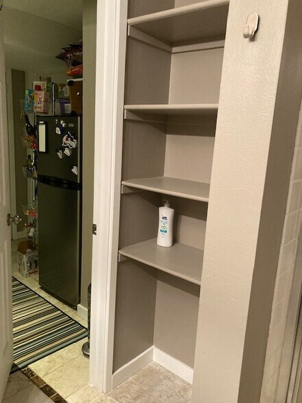 South Bedroom: Bathroom Shelves - 14775 W 30th Pl