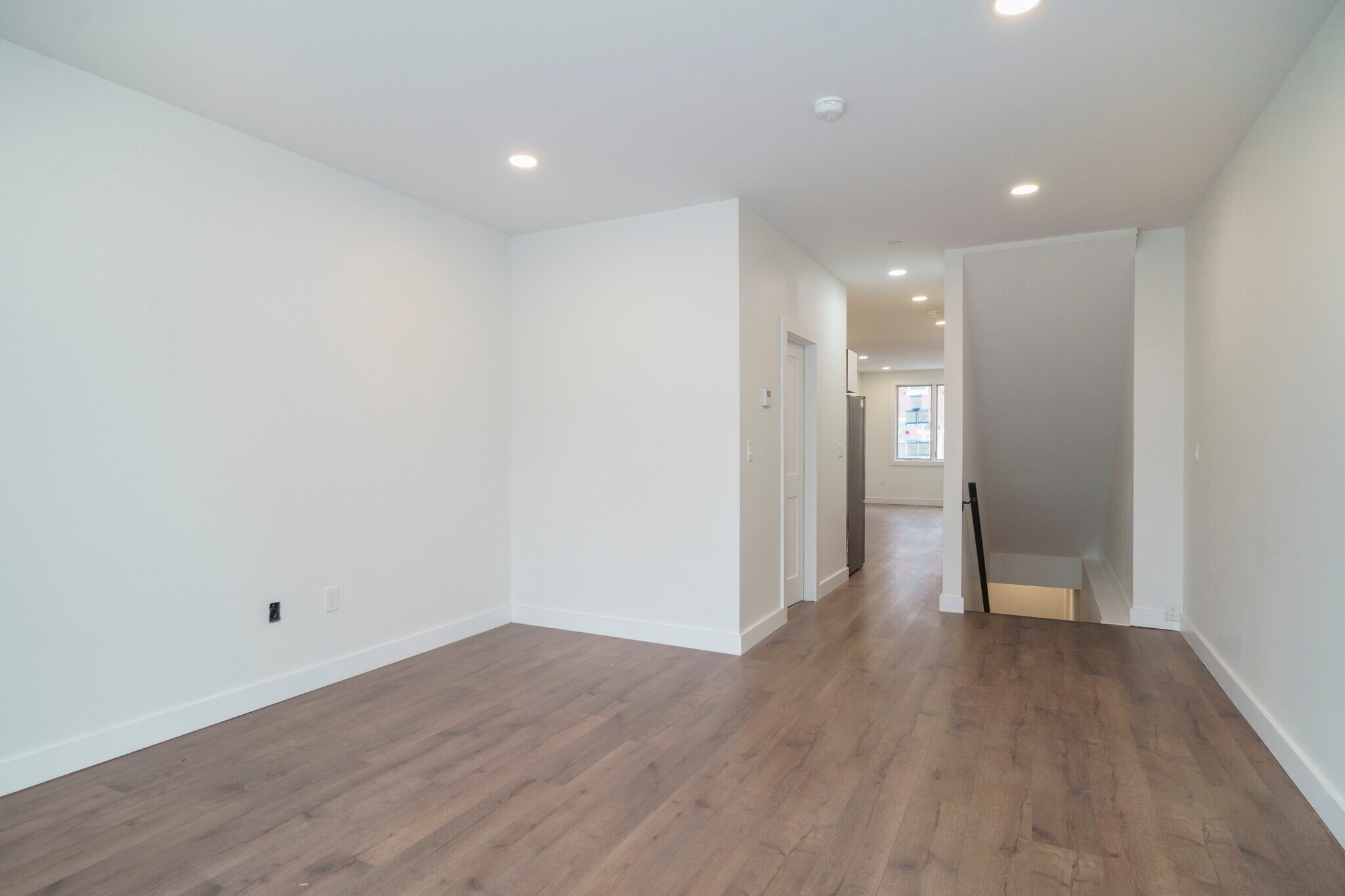 view from living room looking towards 5th st. Stairs down to bedrooms and laundry - 1919 N 5th St