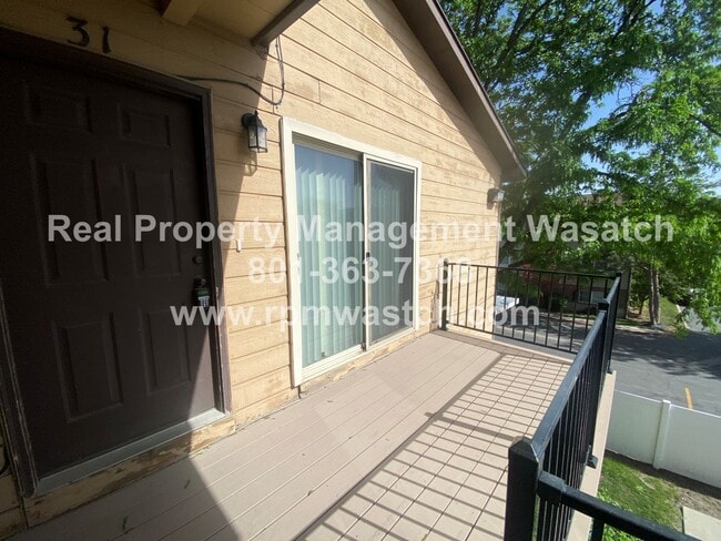 Building Photo - Come See This Great 2 Bedroom 1 Bath Condo In Salt Lake City!