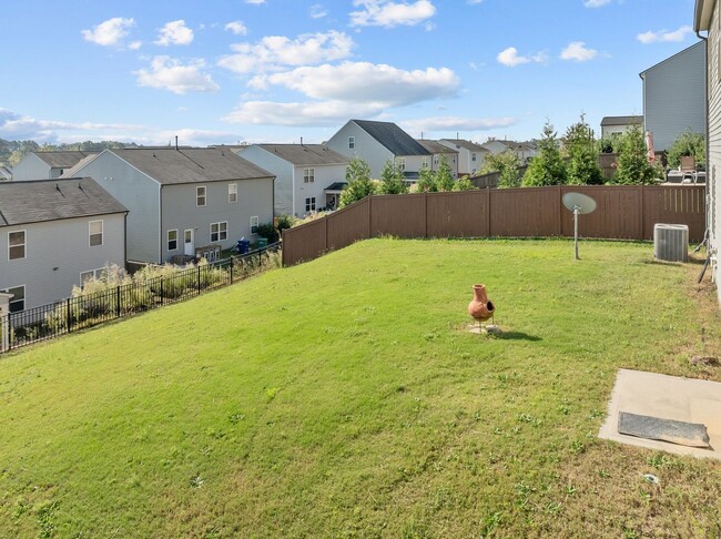 Building Photo - Spacious 5 Bedroom Home with 2-Car Garage,...