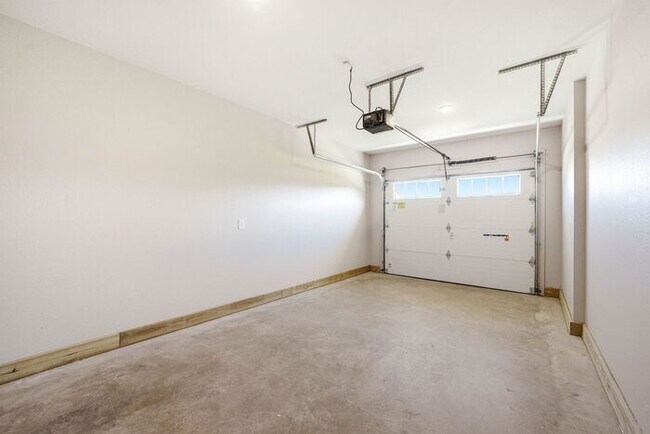 Building Photo - One-Level Living with Private Garage, Feels Like Home, Not an Apartment