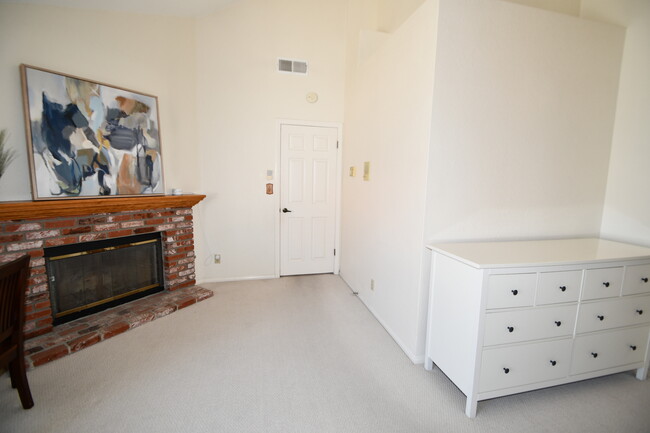 Cozy fireplace in master bedroom. - 1920 Havemeyer Ln