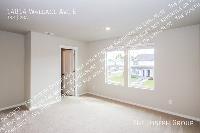 Building Photo - 14814 Wallace Ave E