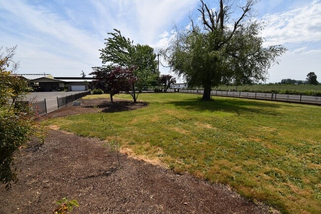 Building Photo - Spacious home on acreage and a Dairy Farm