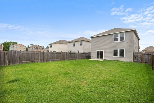 Building Photo - 7810 Pink Dahlia Dr
