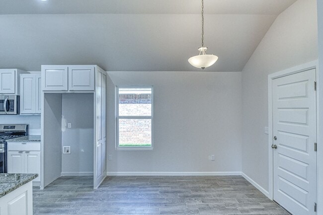 Building Photo - Brand New Construction!  Lawn care included!