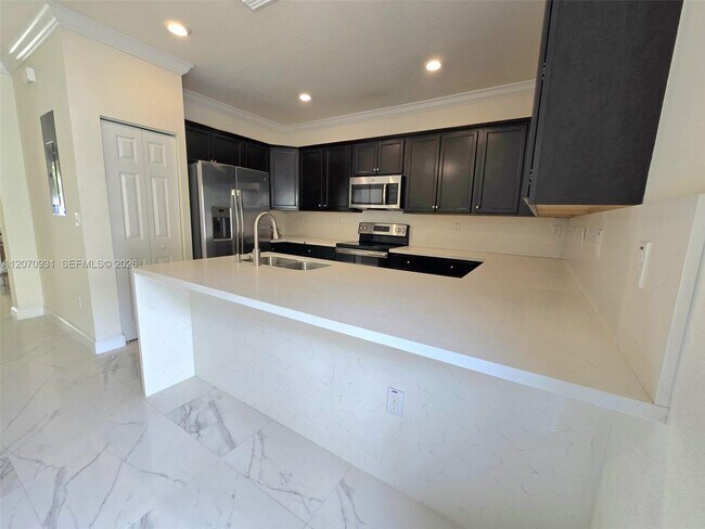 Building Photo - 9267 W 34th Ct