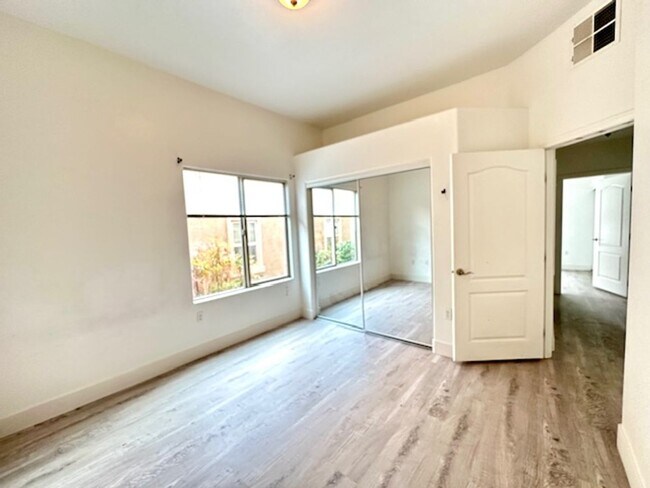 Building Photo - BEAUTIFUL GATED SOUTHWEST CONDO. 3 BEDS AND 2 BATHS. GROUND FLOOR.