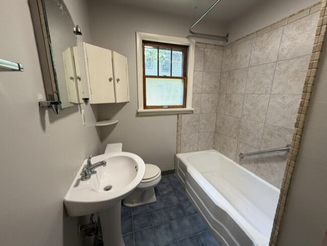 Building Photo - Three Levels of Living with 4 Bedrooms, 2 Full Bathrooms and Multiple Living Areas!