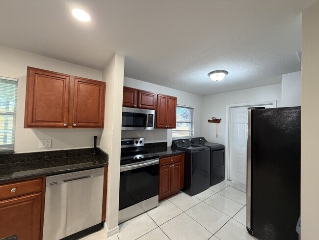 Building Photo - "Charming 3-Bedroom Home with Gleaming Hardwood Floors!"