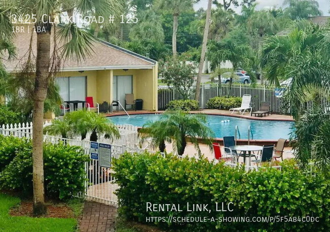 Building Photo - Spacious condo with a private patio, pool,...