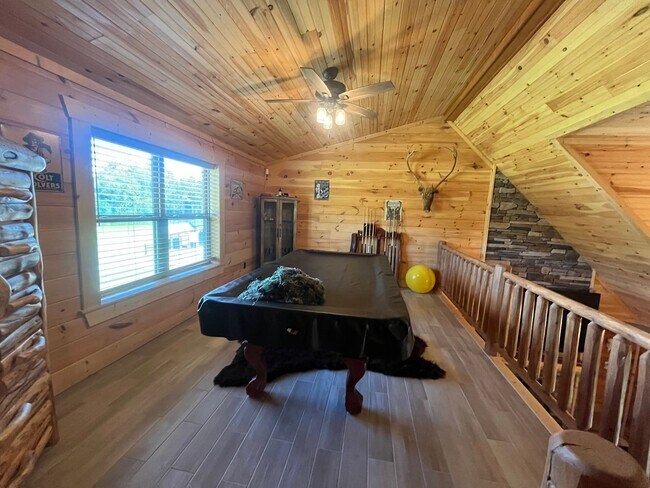 Building Photo - Gorgeous 3-Bedroom Log Cabin with Loft, Large Shop & Stocked Pond – Near Branford, FL