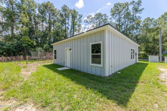 Building Photo - 2025 NEW BUILT 2 BR 2 BA Rental that could be a 3BR