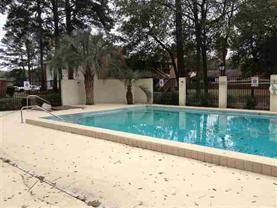 Building Photo - 2/1 Condo with screened porch and community pool