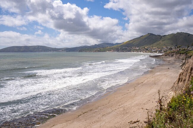 Building Photo - This Sunset Beach Estates Townhome will have you speechless!