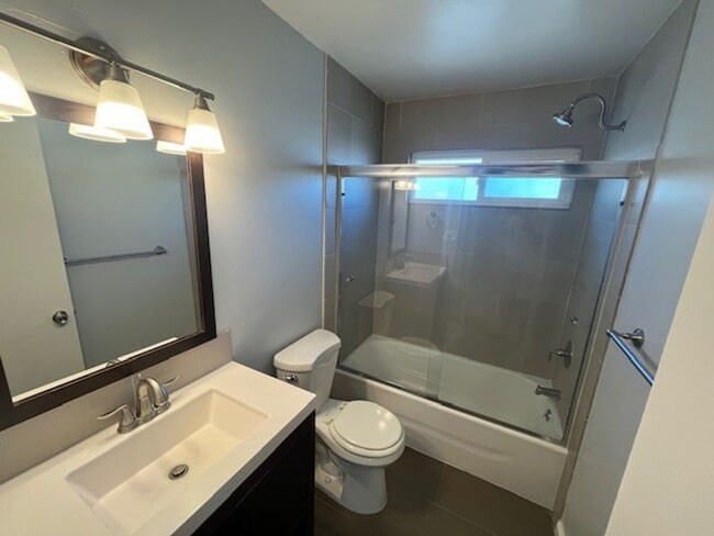 Building Photo - PETS OK!  2-story townhome with 2 bedrooms...