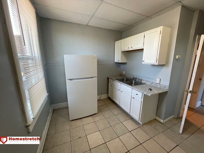 Building Photo - One Bedroom Unit Available! No Deposit for...