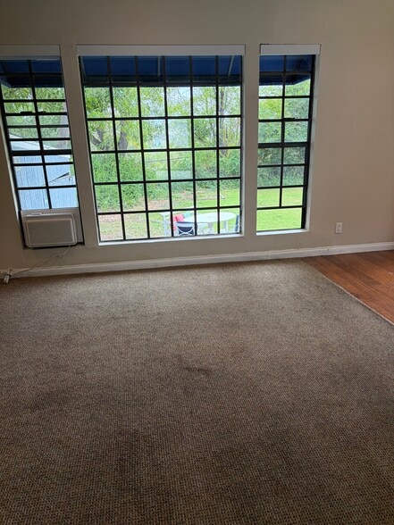 Large window for view of trees & yard. Black out window roller blindss - 665 Rim Rd