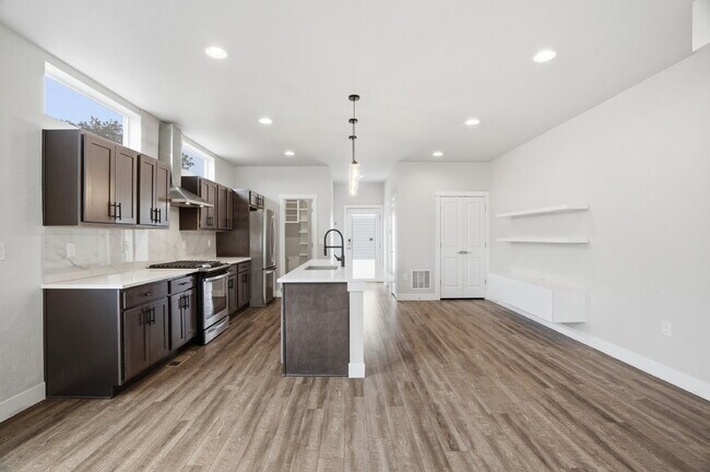 Building Photo - $3,940.95 - 3 Bed, 2.5 Bath Townhome In Denver with Central AC and Outdoor Space!