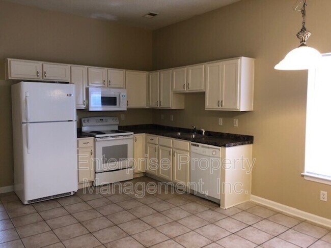 Building Photo - 6833 Kamali Ave