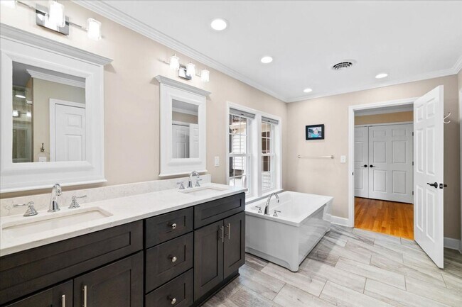 Building Photo - Spacious Home with Fenced Yard Exclusive A...