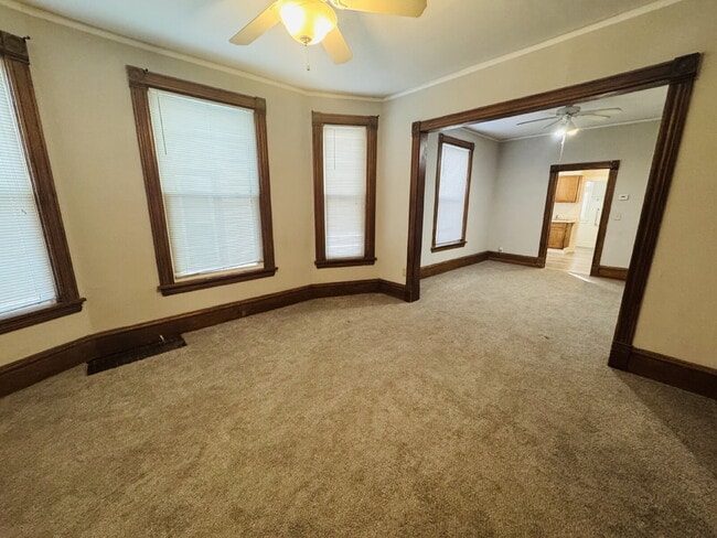 Building Photo - Charming 1-Bedroom + Den Retreat on Colfax Ave – Your Cozy Minneapolis Haven Awaits!